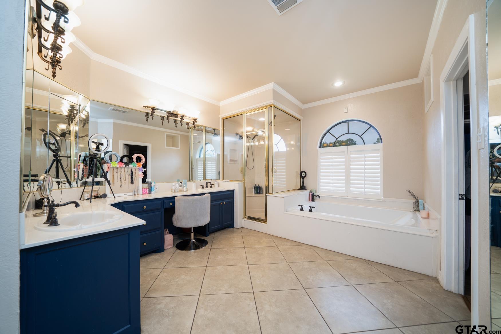 2 Joseph Circle Longview, TX 75601 - Photo 18 of 35 a spacious bathroom with a tub sink and mirror