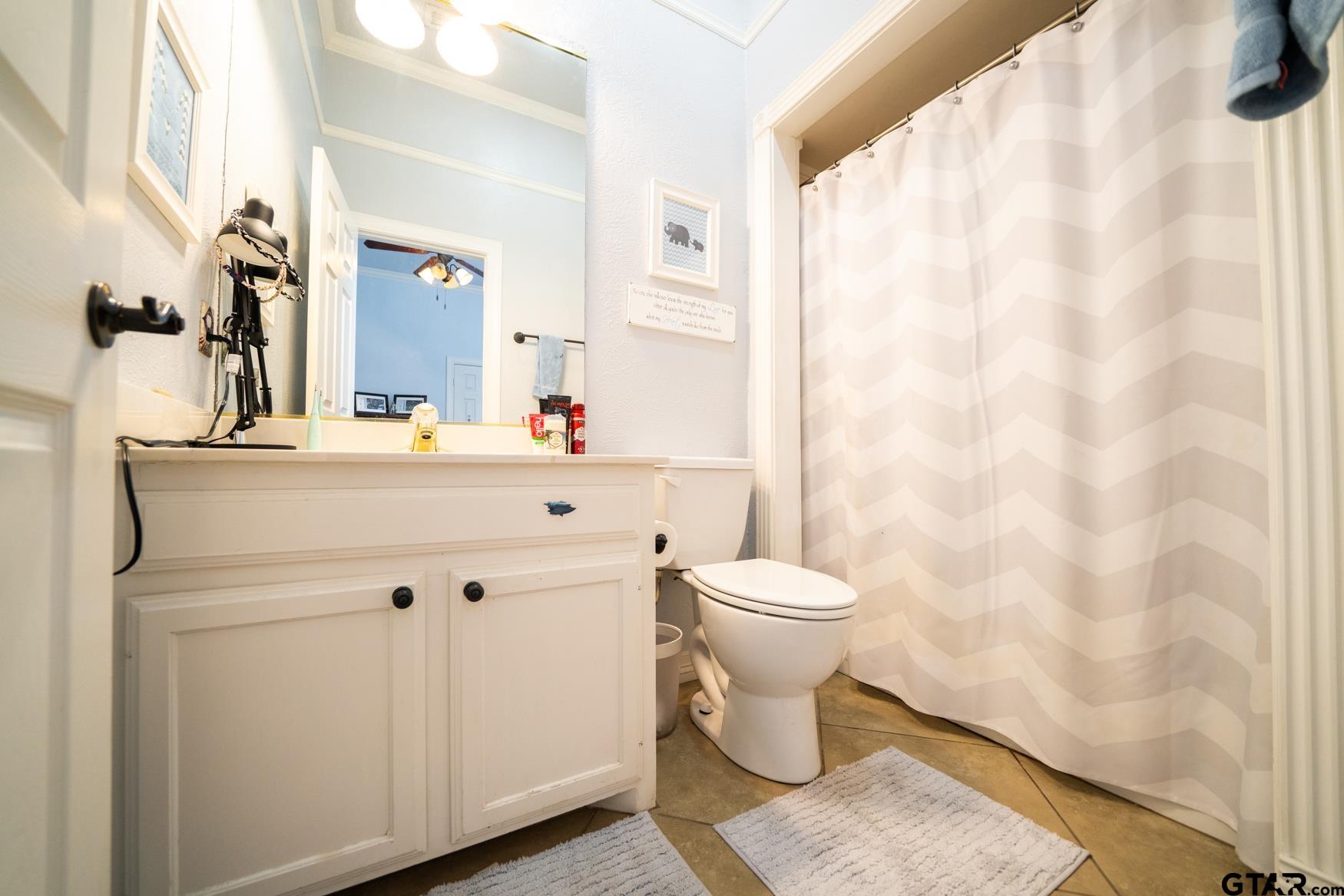 2 Joseph Circle Longview, TX 75601 - Photo 23 of 35 a bathroom with a sink toilet and shower