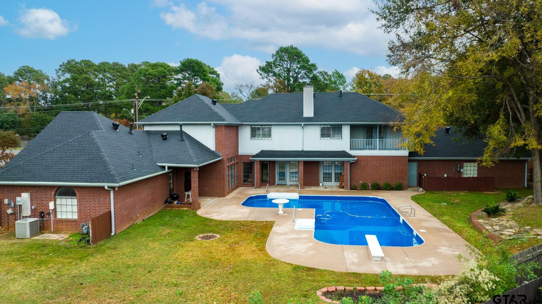 2 Joseph Circle Longview, TX 75601 - Photo 32 of 35 a view of house with swimming pool yard and outdoor seating