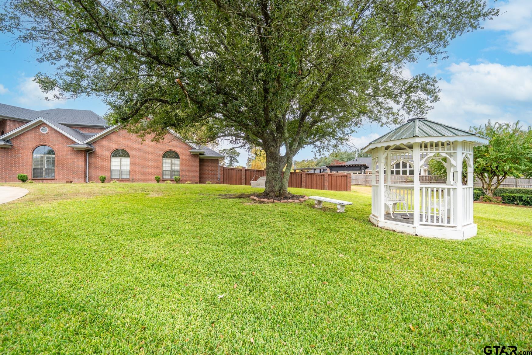 2 Joseph Circle Longview, TX 75601 - Photo 33 of 35 a front view of a house with a yard