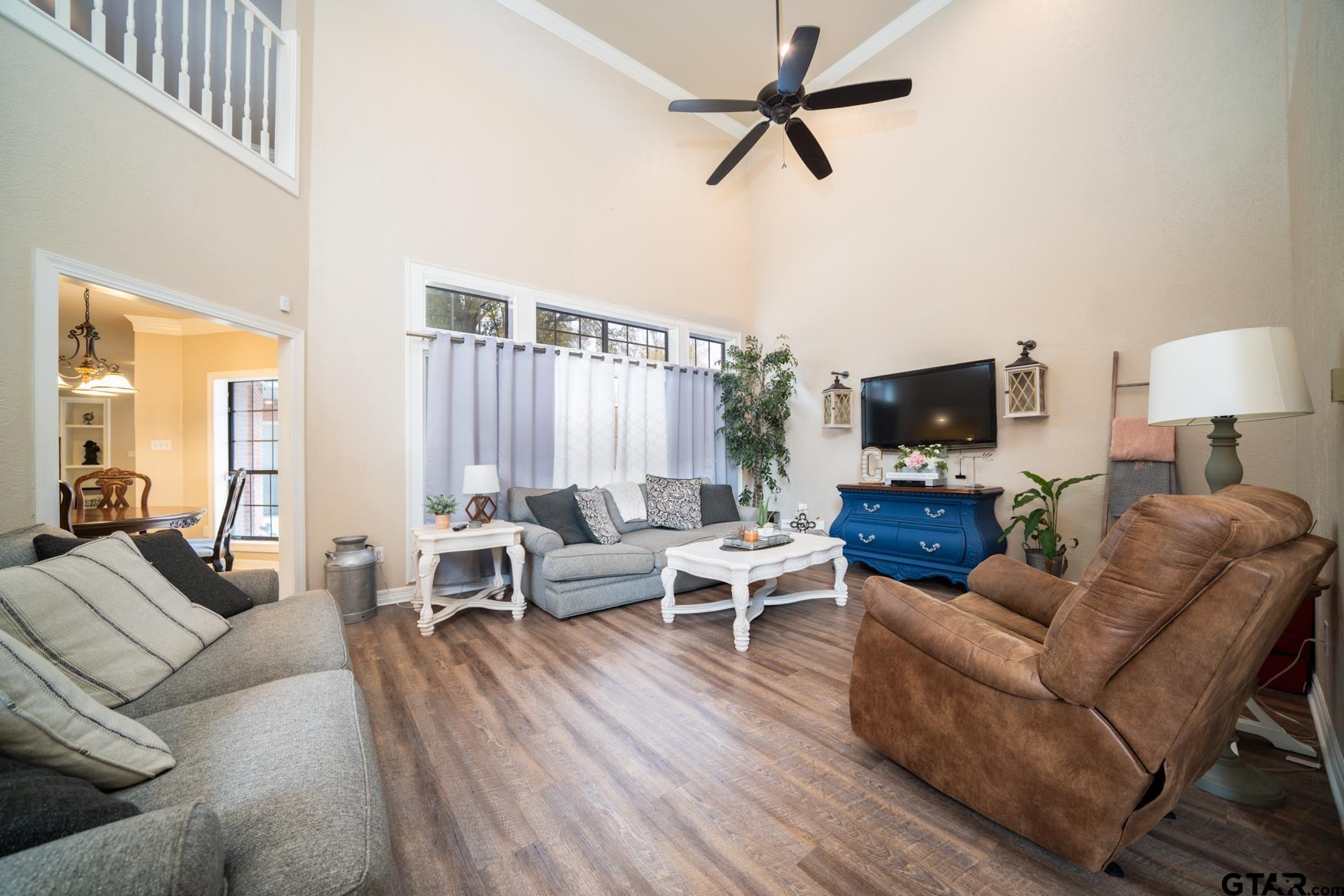 2 Joseph Circle Longview, TX 75601 - Photo 4 of 35 a living room with furniture and a flat screen tv