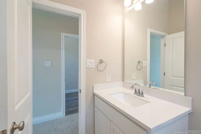 a bathroom with a shower and a toilet