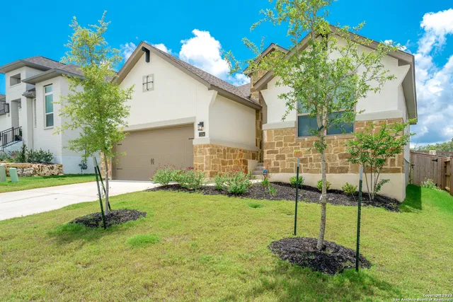 a house view with a garden space