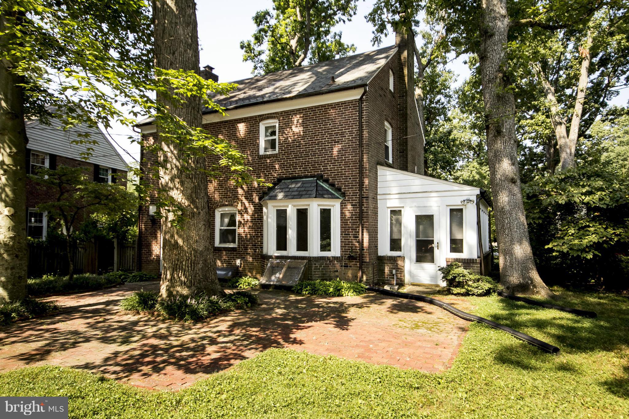 6911 Kenleigh Road Baltimore, MD 21212 - Photo 23 of 26 a front view of a house with a yard