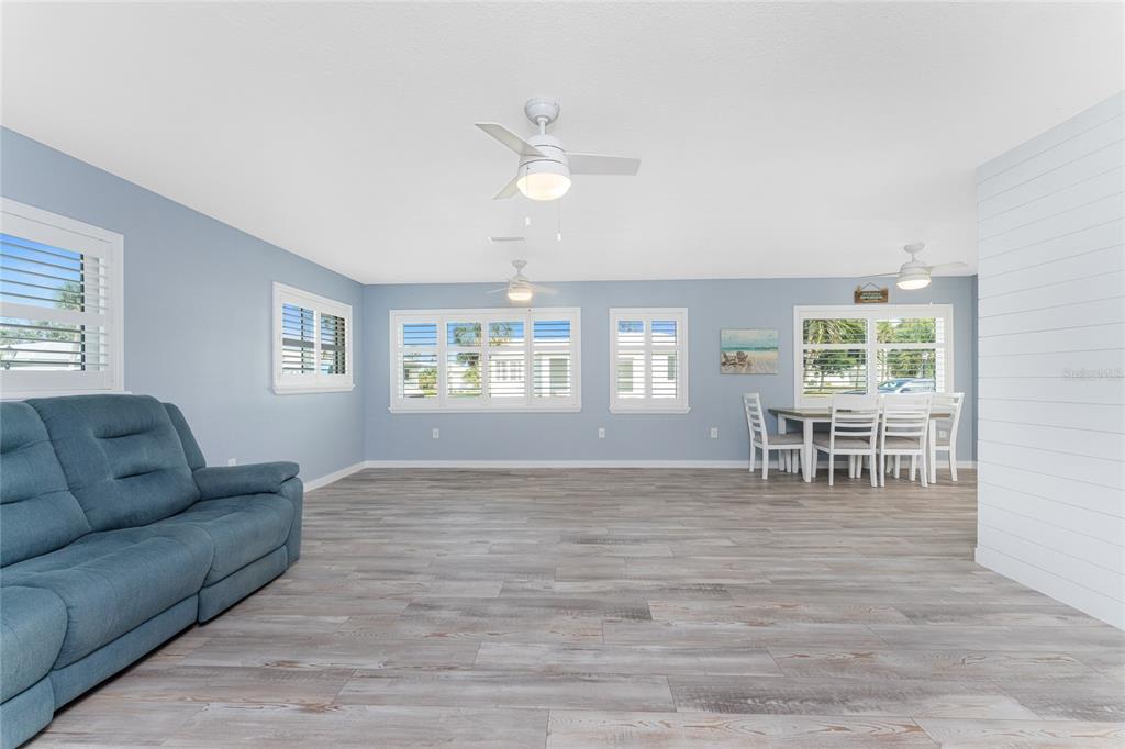 1977 Beach Road, Unit 3 Englewood, FL 34223 - Photo 13 of 56 a living room with furniture and a window