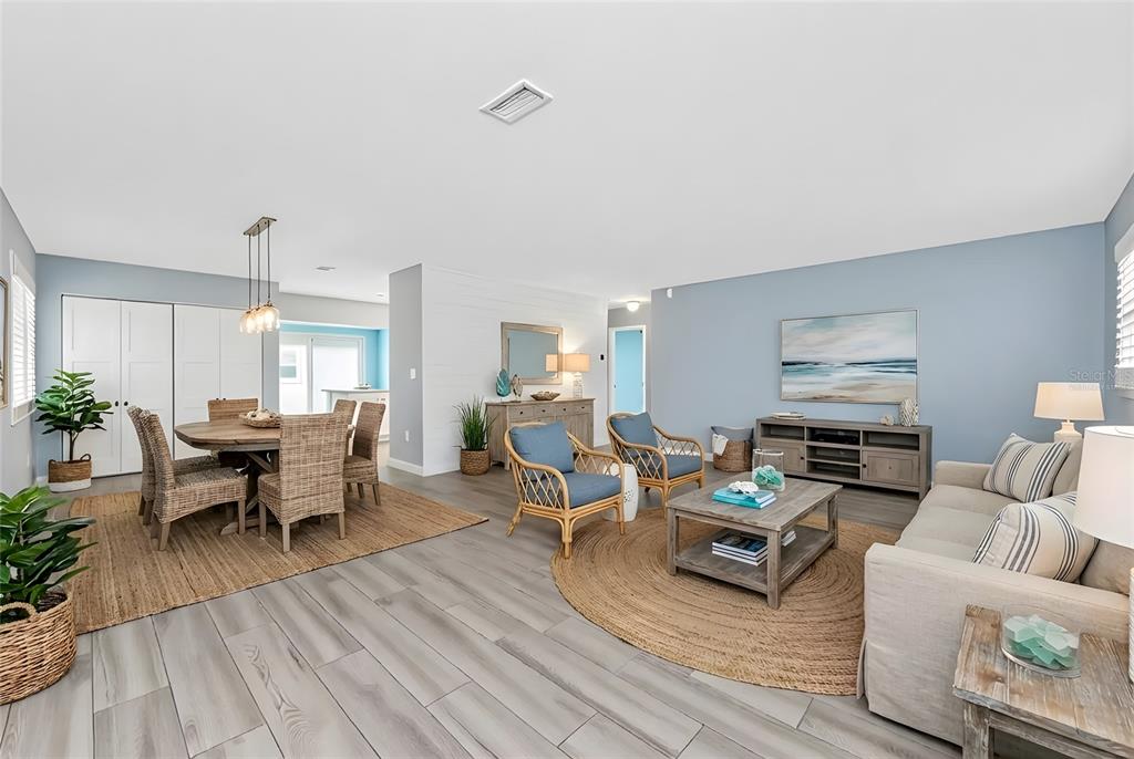 1977 Beach Road, Unit 3 Englewood, FL 34223 - Photo 16 of 56 a living room with furniture and wooden floor