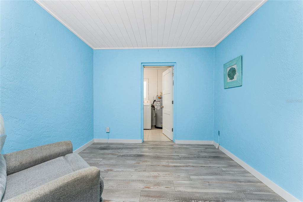 1977 Beach Road, Unit 3 Englewood, FL 34223 - Photo 22 of 56 a view of a livingroom with wooden floor