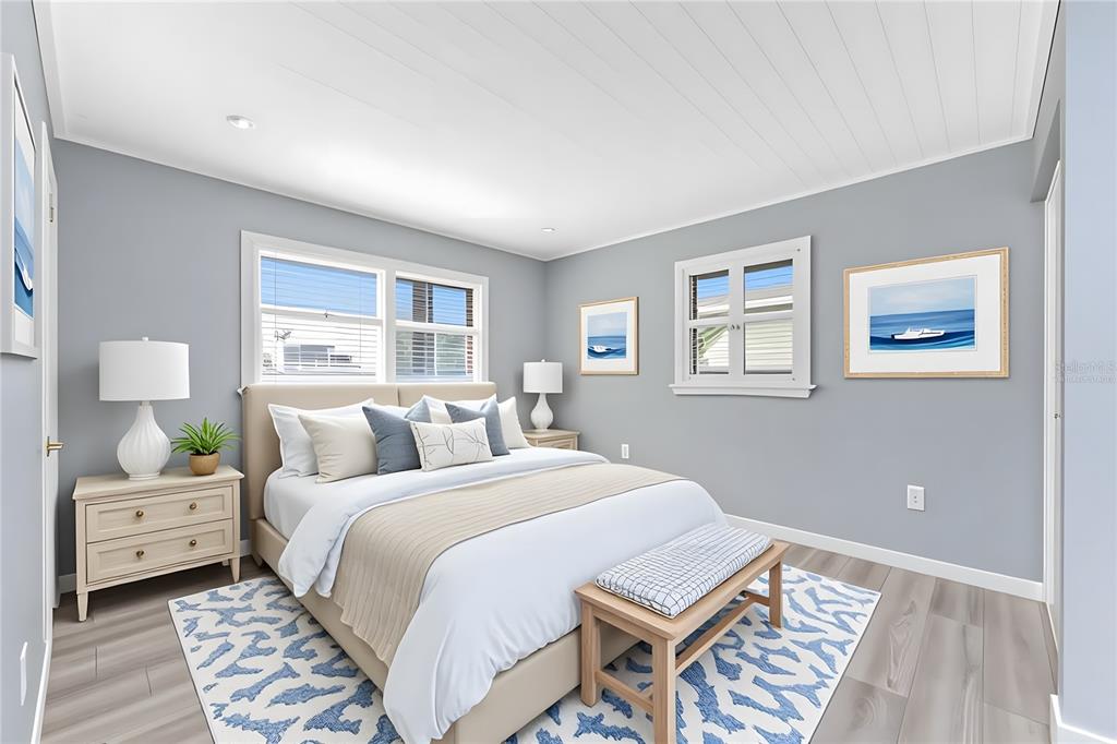 1977 Beach Road, Unit 3 Englewood, FL 34223 - Photo 30 of 56 a bedroom with a bed and a window