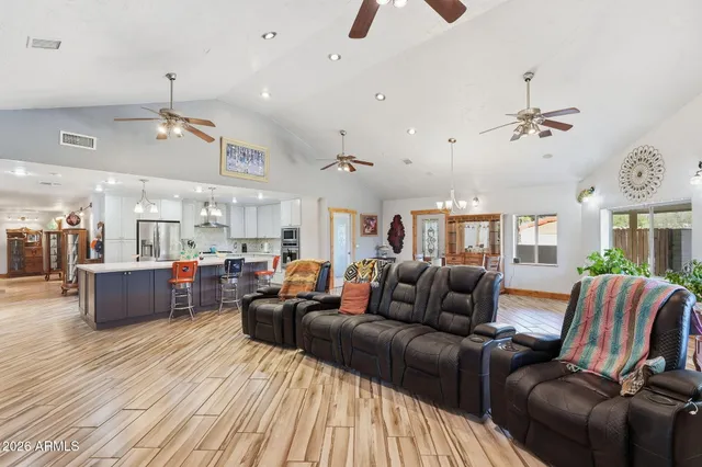 a view of walk in closet with clothes