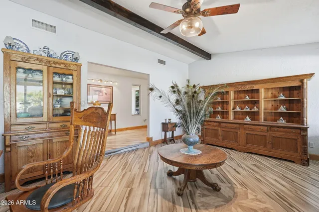 a bathroom with a sink a vanity and a mirror
