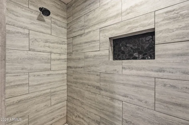 a view of a garage with a bike and storage