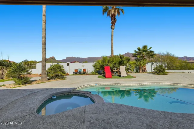 an aerial view of a houses with a lake view