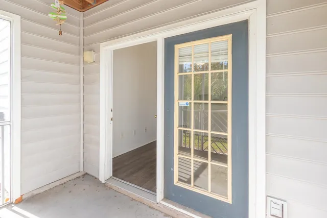 a view of a room that has a window in it