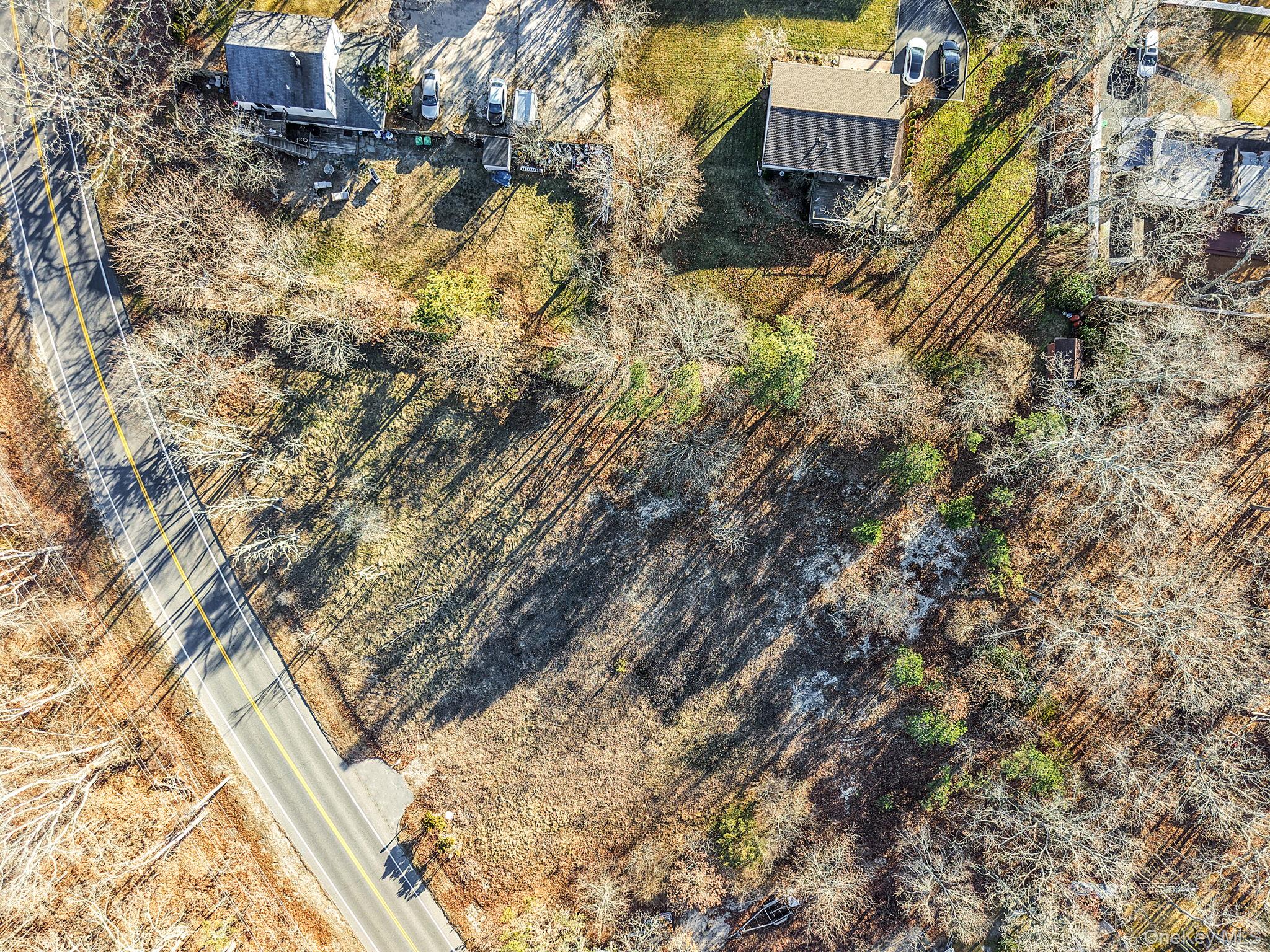 267 Old Country Road Eastport, NY 11941 - Photo 12 of 16 a backyard of a building