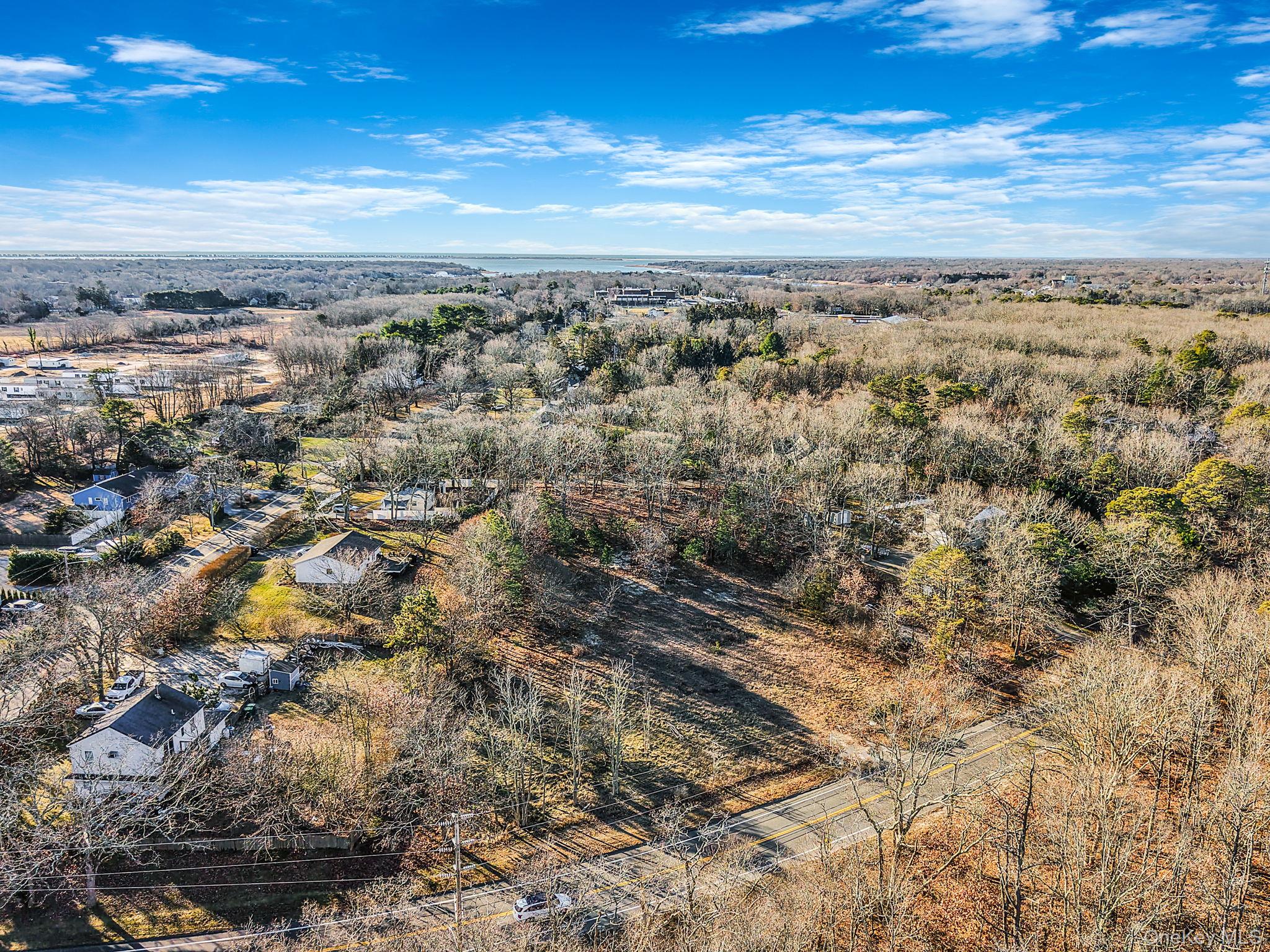 267 Old Country Road Eastport, NY 11941 - Photo 6 of 16 an aerial view of residential building and green space