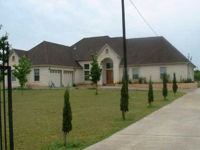 a front view of house with yard