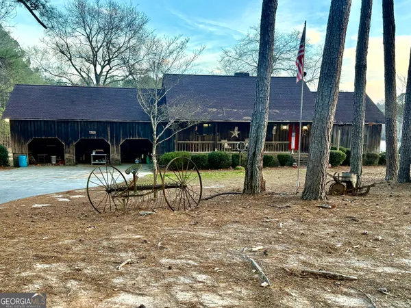 a view of house with outdoor space