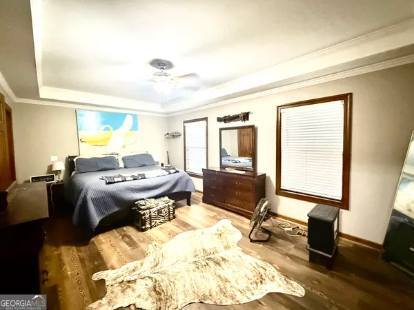 a living room with a couch and a dining table