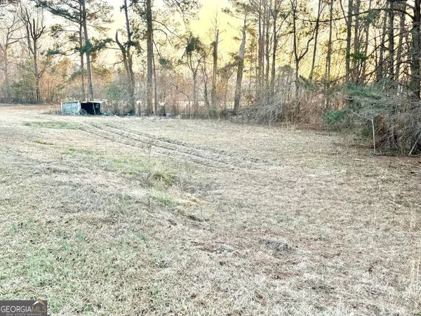 a view of a lake with a mountain in the background