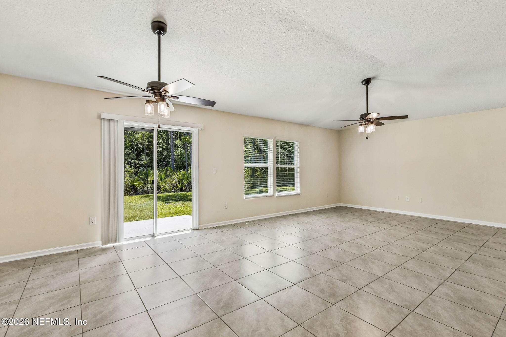 86607 Nassau Crossing Way Yulee, FL 32097 - Photo 4 of 50 Morning light and preserve views