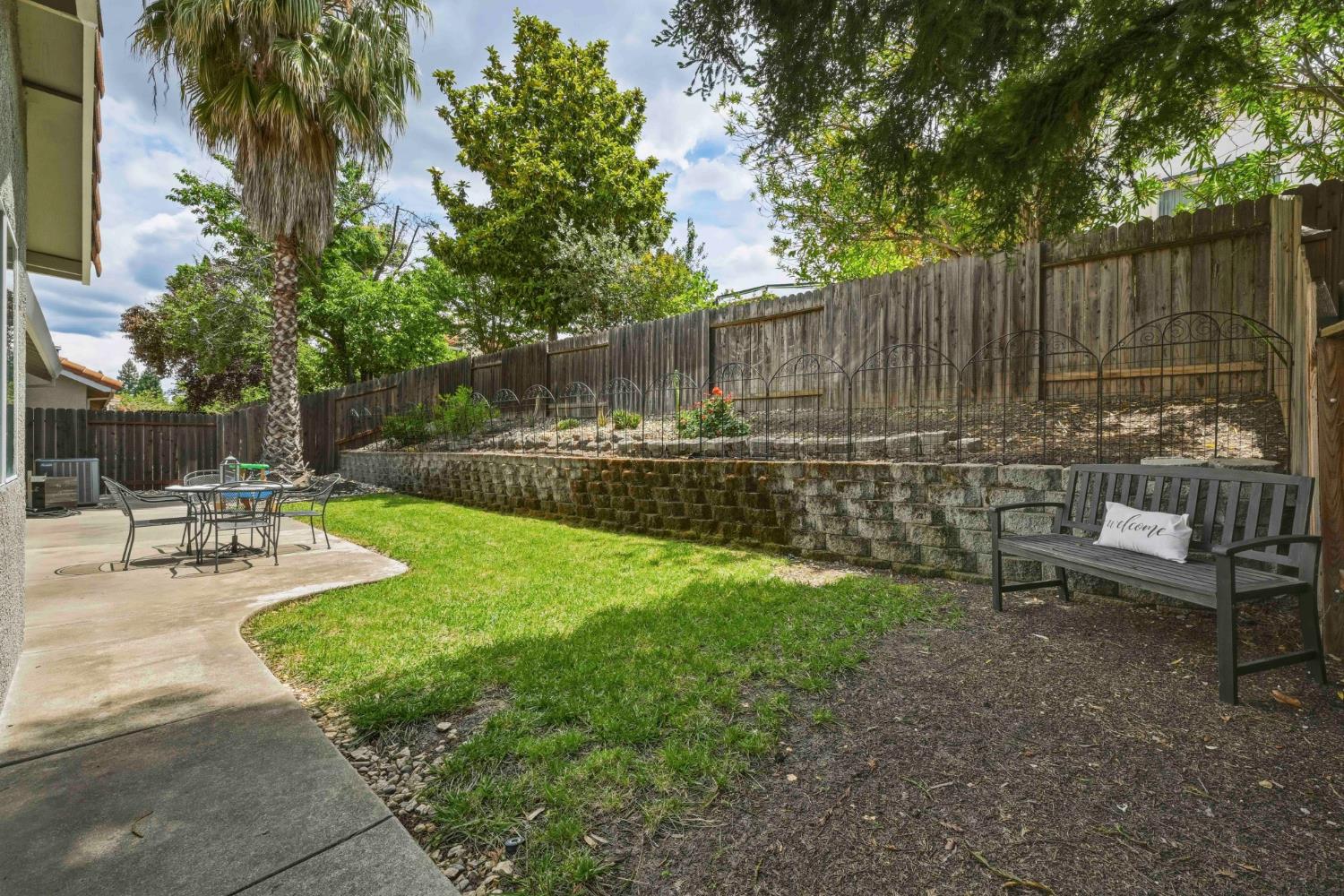 5013 Charter Road Rocklin, CA 95765 - Photo 30 of 35 a view of a backyard with sitting area