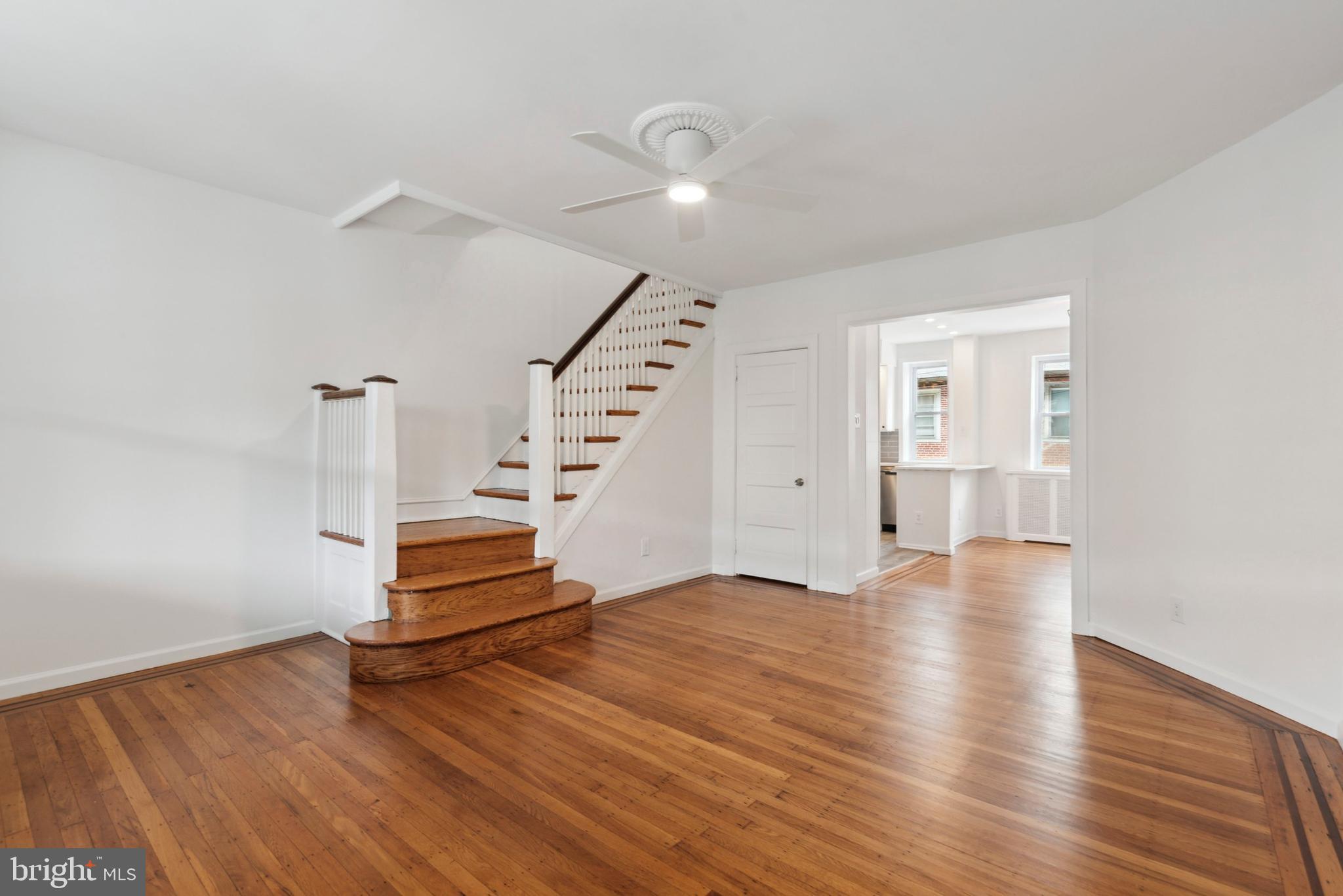 5631 Ridgewood Street Philadelphia, PA 19143 - Photo 2 of 13 Living Room with beautifully finished stairwell