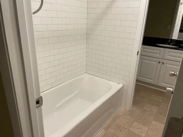 a bathroom with a bathtub