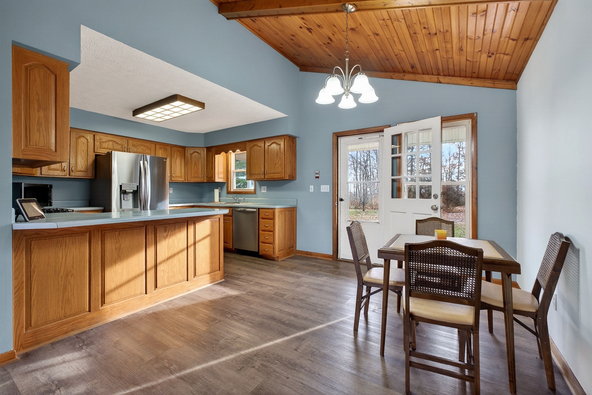 8607 Bockman Way Sparta, TN 38583 - Photo 12 of 34 a view of a dining room with furniture window and wooden floor