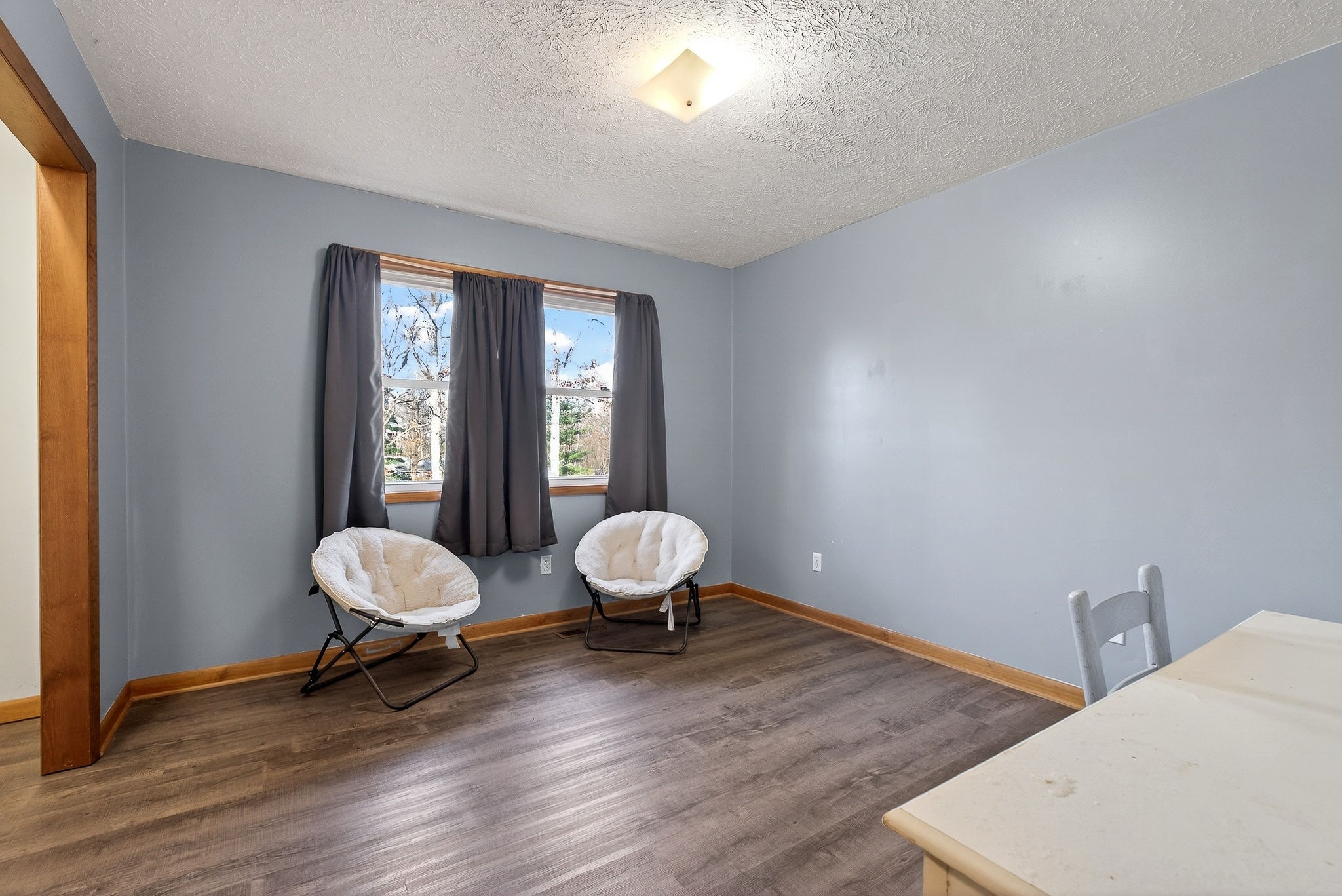 8607 Bockman Way Sparta, TN 38583 - Photo 19 of 34 a living room with furniture and a window