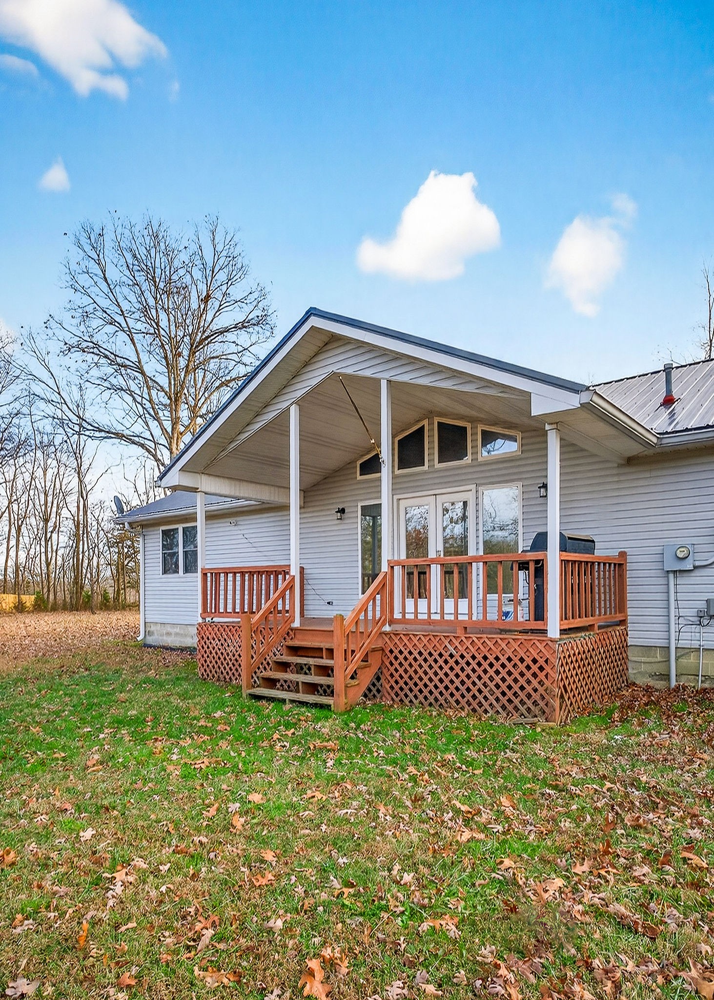 8607 Bockman Way Sparta, TN 38583 - Photo 2 of 34 a front view of a house with garden