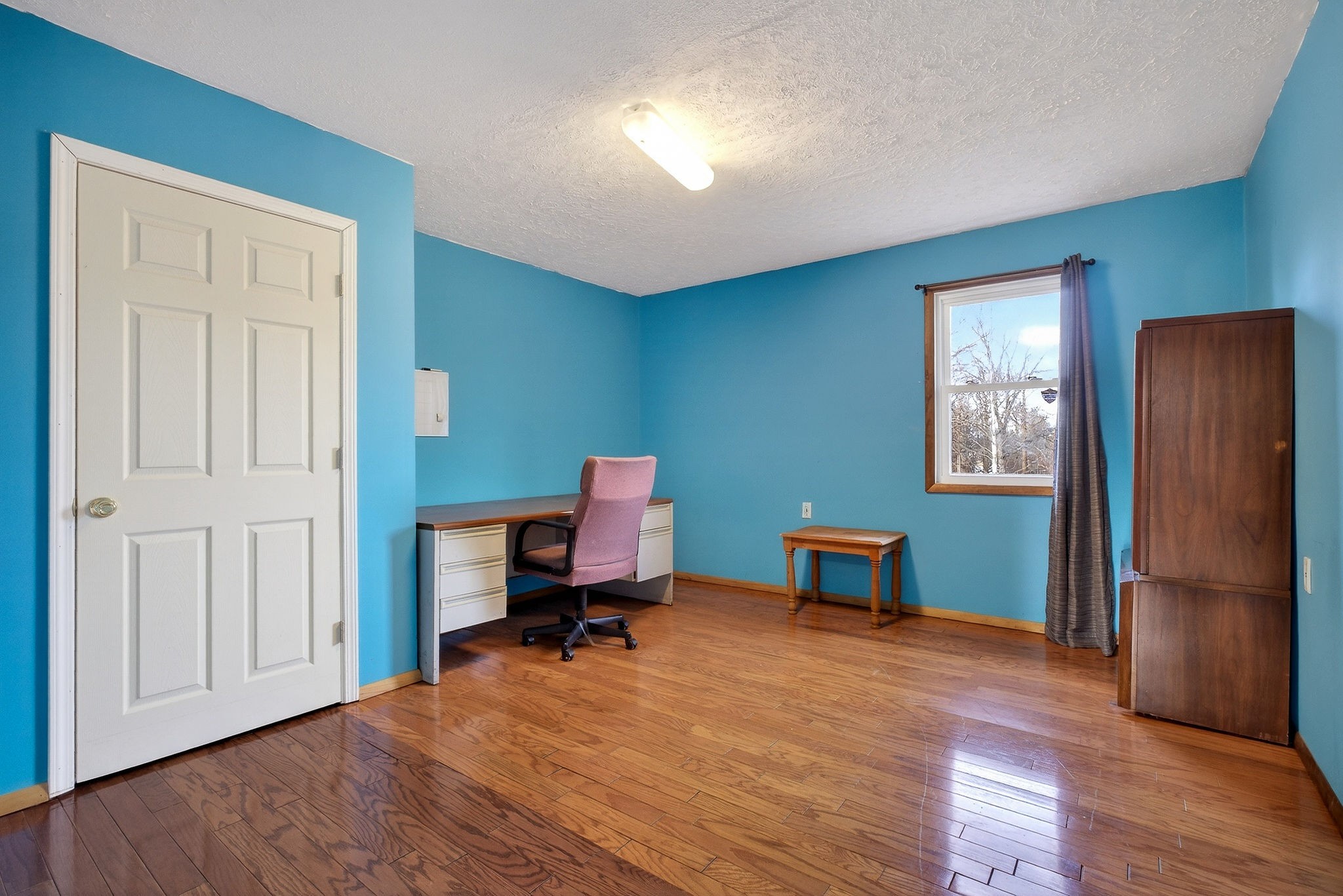 8607 Bockman Way Sparta, TN 38583 - Photo 22 of 34 a workspace with furniture hardwood and a window