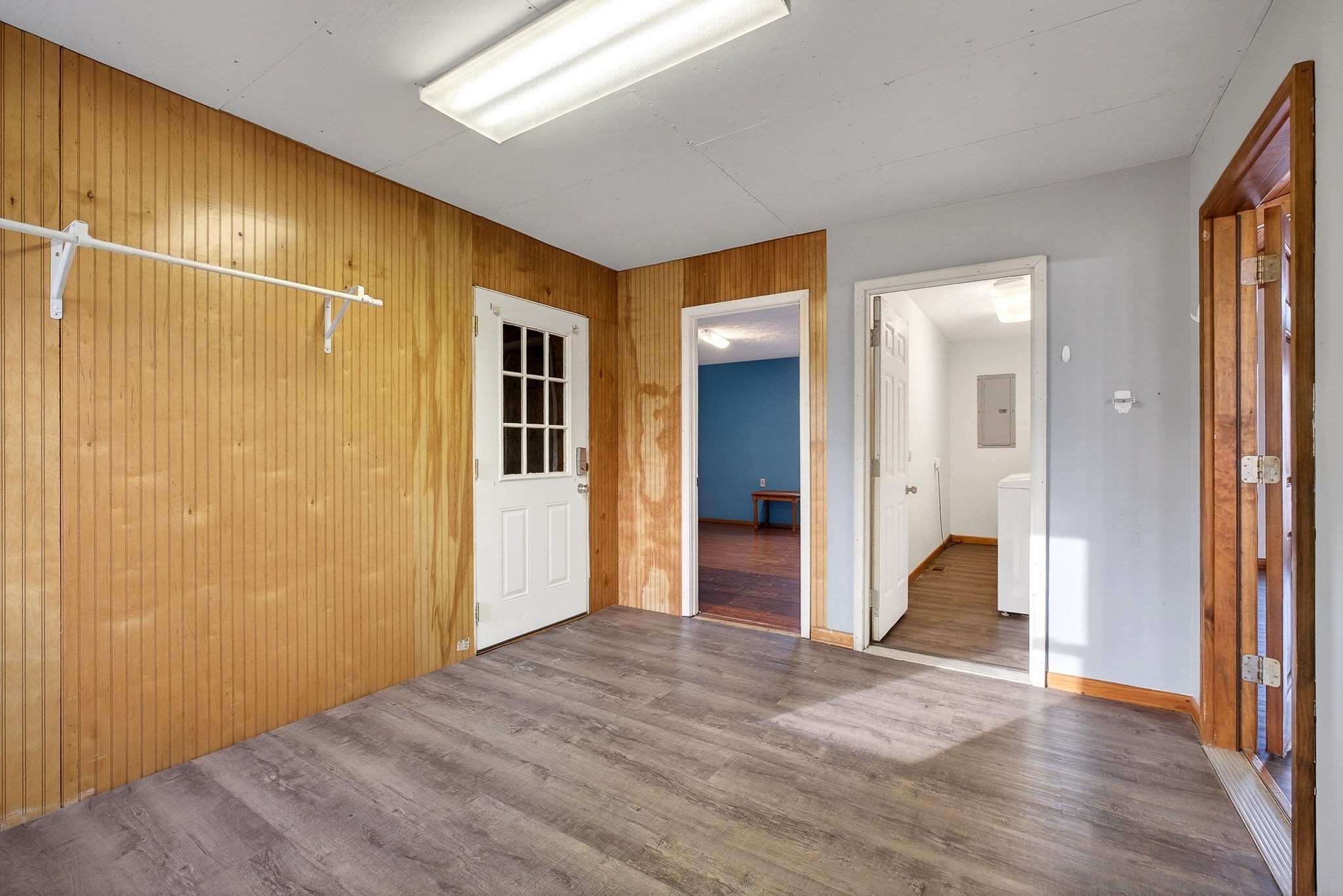 8607 Bockman Way Sparta, TN 38583 - Photo 24 of 34 a view of a livingroom with wooden floor and a bathroom