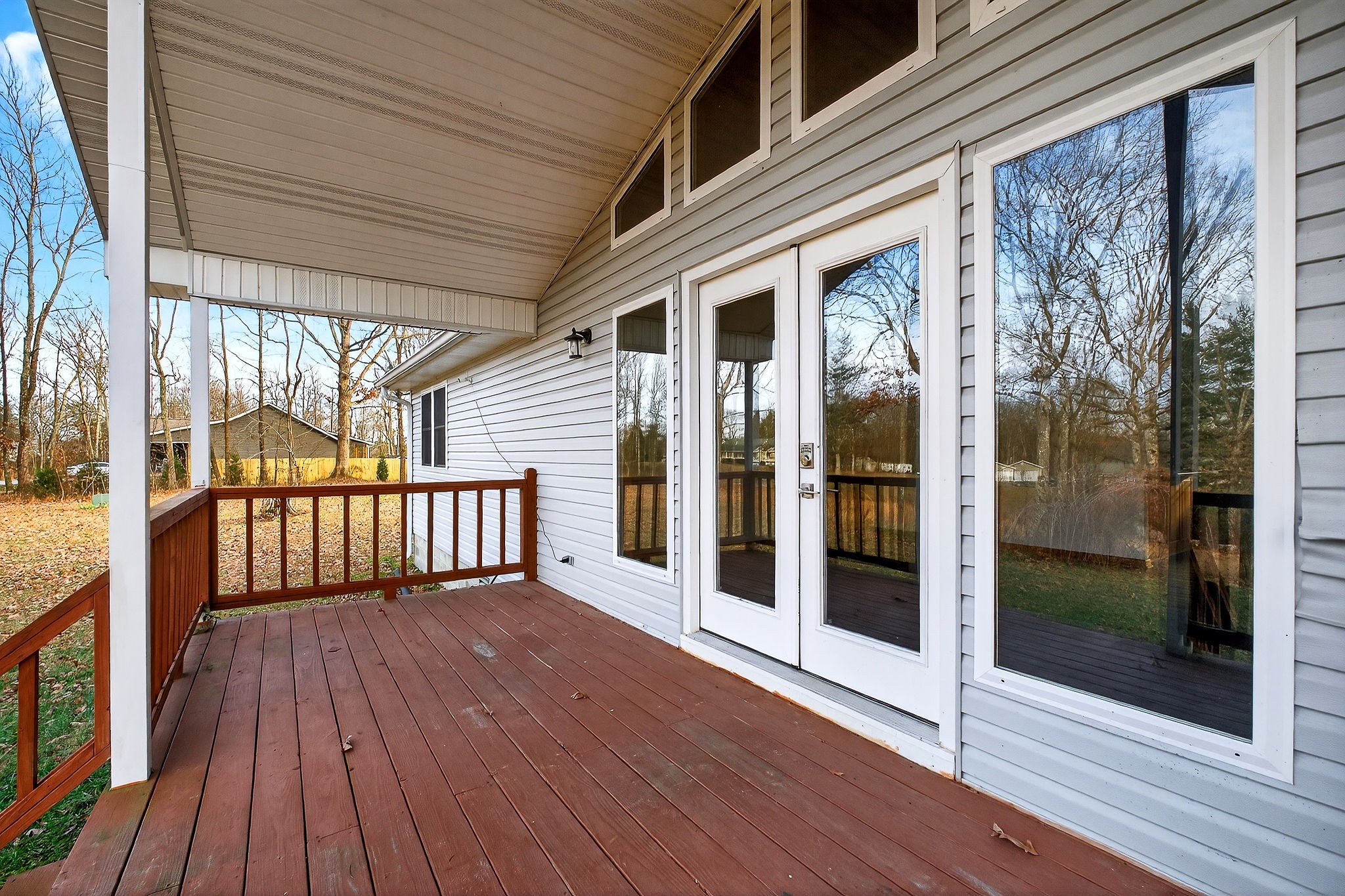 8607 Bockman Way Sparta, TN 38583 - Photo 3 of 34 a view of a balcony with wooden floor