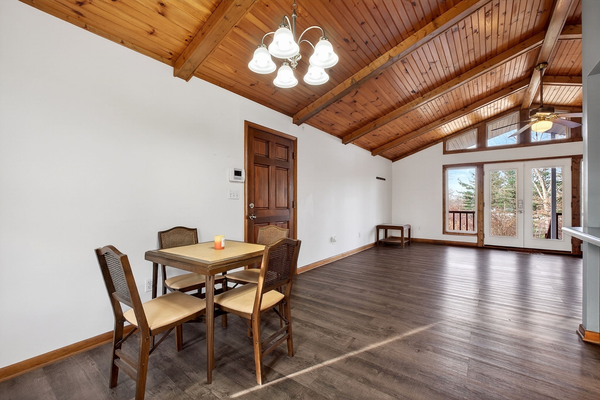 8607 Bockman Way Sparta, TN 38583 - Photo 10 of 34 a view of a dining room with furniture wooden floor and chandelier