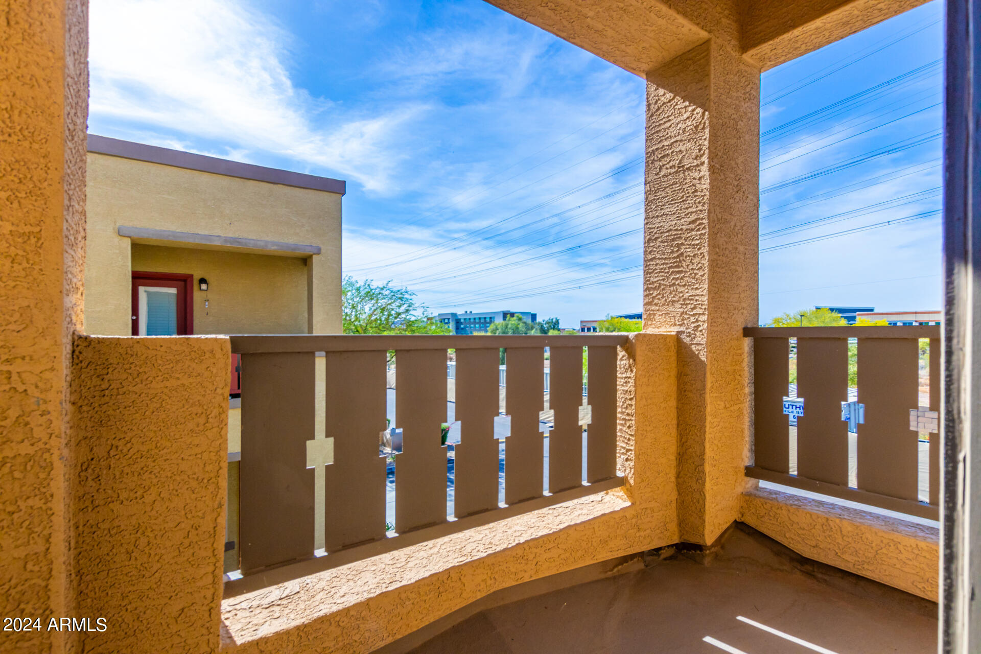 2150 West Alameda Road, Unit 1182 Phoenix, AZ 85085 - Photo 12 of 47 a view of a building from a balcony