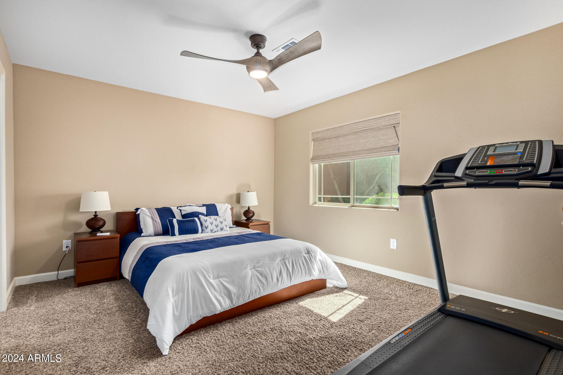 2150 West Alameda Road, Unit 1182 Phoenix, AZ 85085 - Photo 20 of 47 a bedroom with a bed and a window