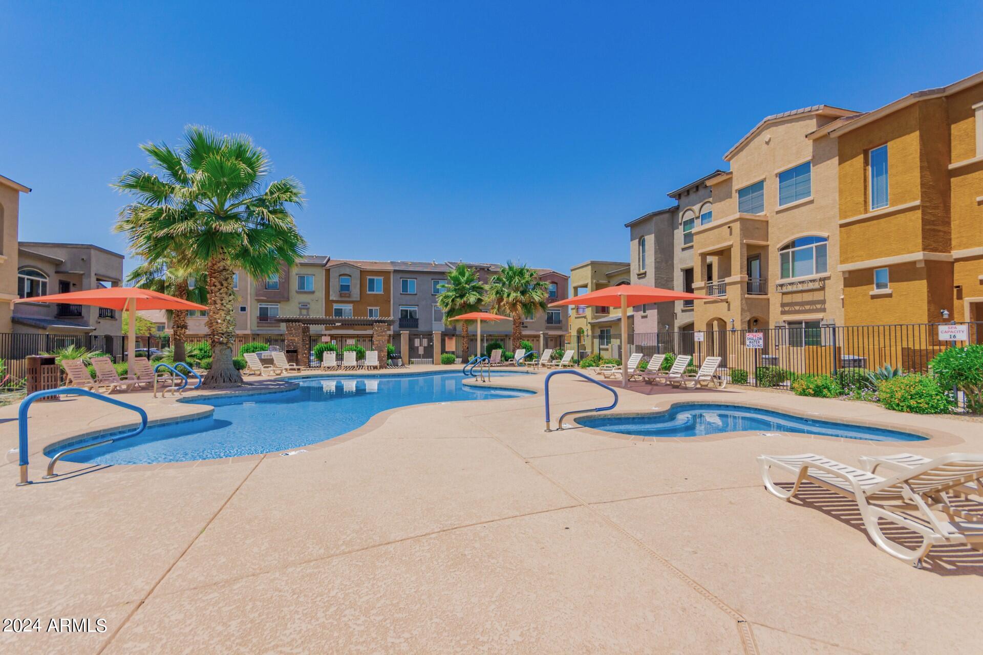 2150 West Alameda Road, Unit 1182 Phoenix, AZ 85085 - Photo 33 of 47 a view of building with outdoor seating