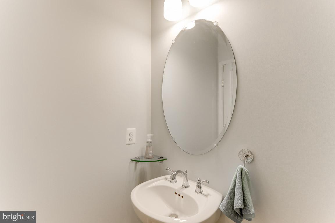 944 Lindley Road Frederick, MD 21701 - Photo 24 of 58 Powder room with updated lighting & shelving