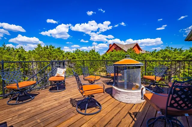 a view of a terrace with furniture