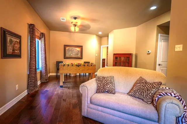 a room with toys and wooden floor