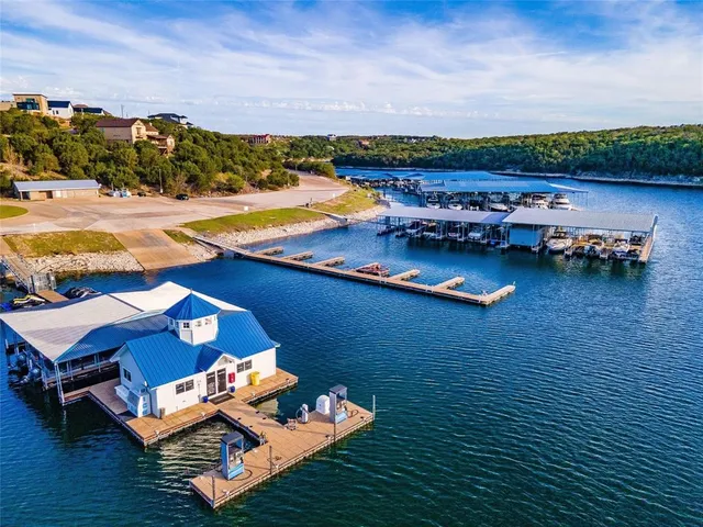 an aerial view of a houses with outdoor space