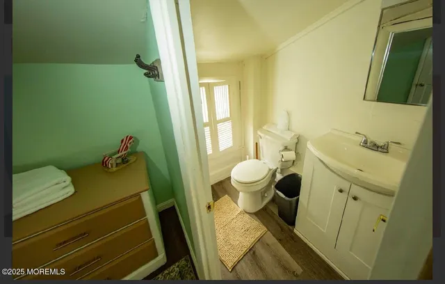 a bathroom with a sink and toilet
