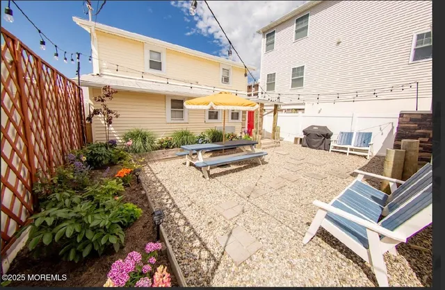 a view of a terrace with chairs