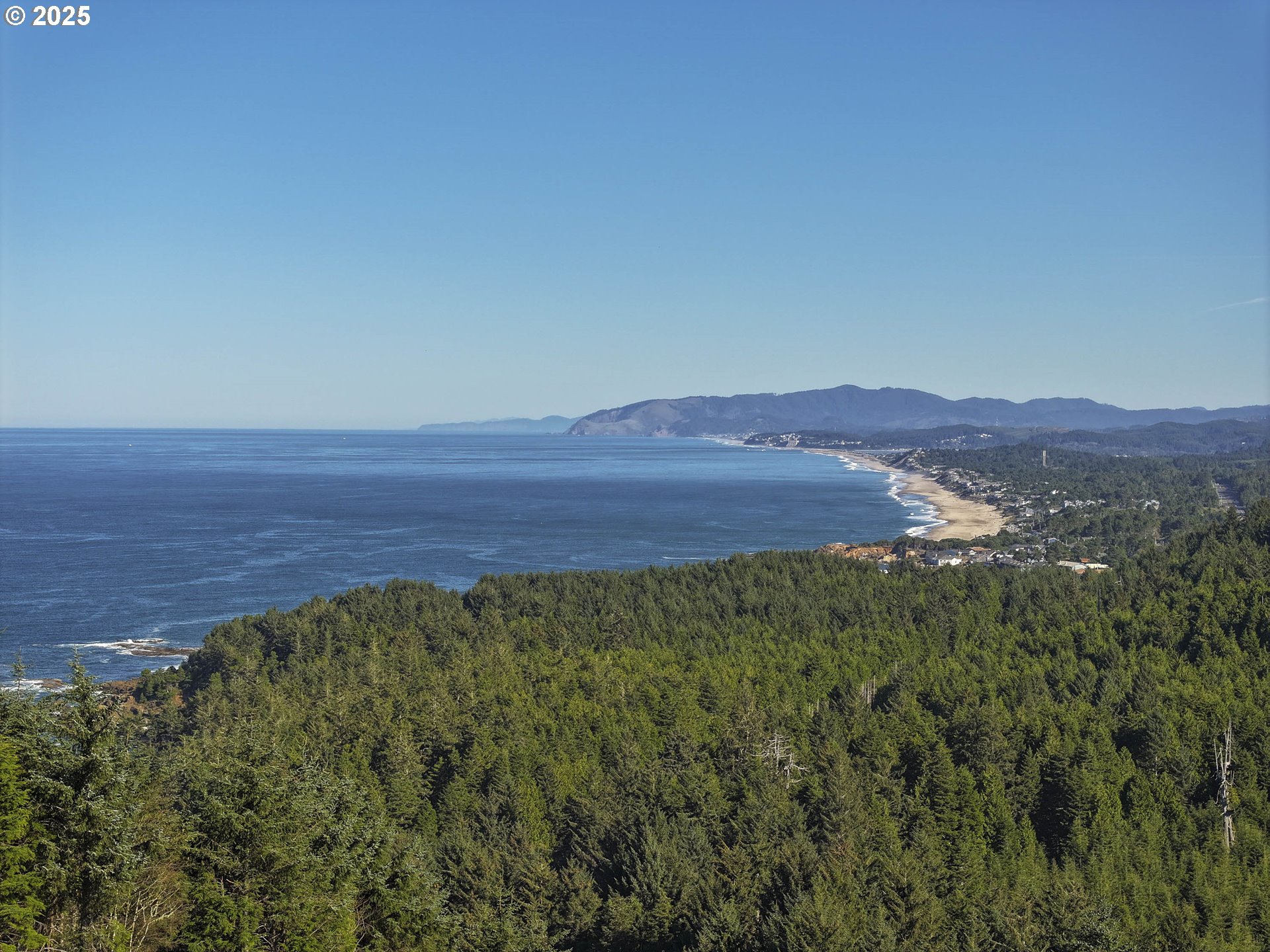 0 Northeast Lillian Lane, Unit LOT 24 Depoe Bay, OR 97341 - Photo 12 of 16 a view of an outdoor space and mountain view
