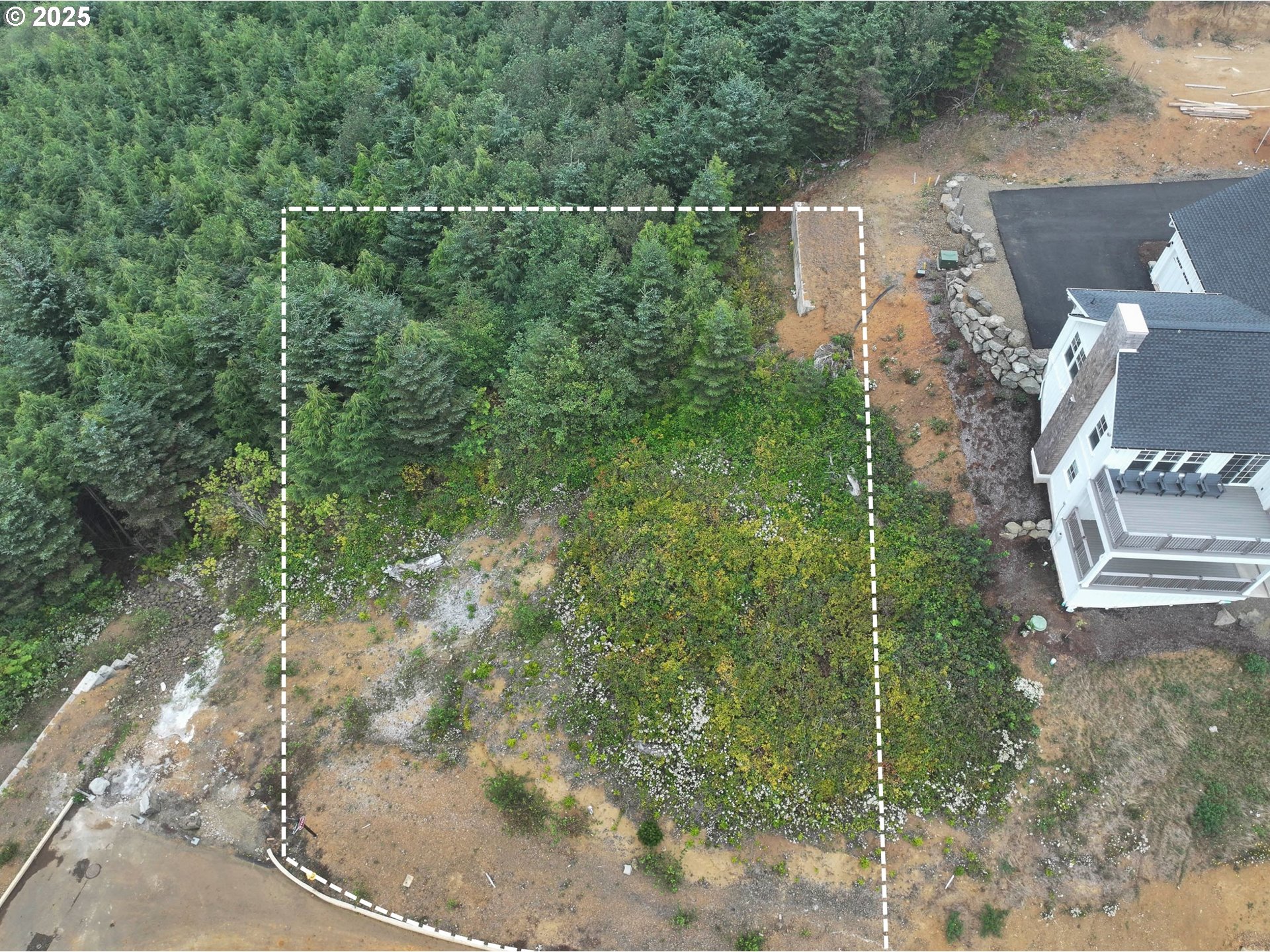 0 Northeast Lillian Lane, Unit LOT 24 Depoe Bay, OR 97341 - Photo 16 of 16 a view of a forest