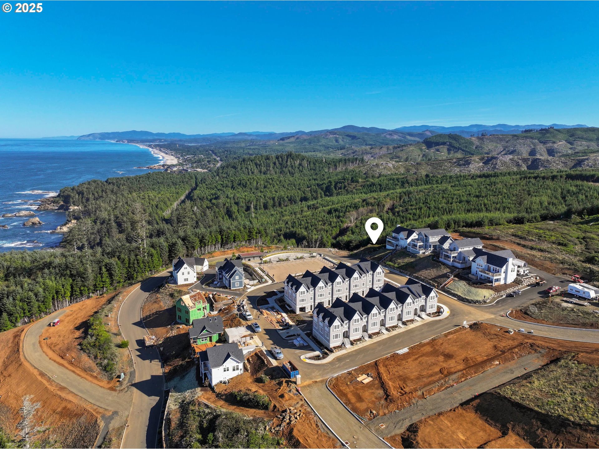 0 Northeast Lillian Lane, Unit LOT 24 Depoe Bay, OR 97341 - Photo 2 of 16 an aerial view of a house with a garden