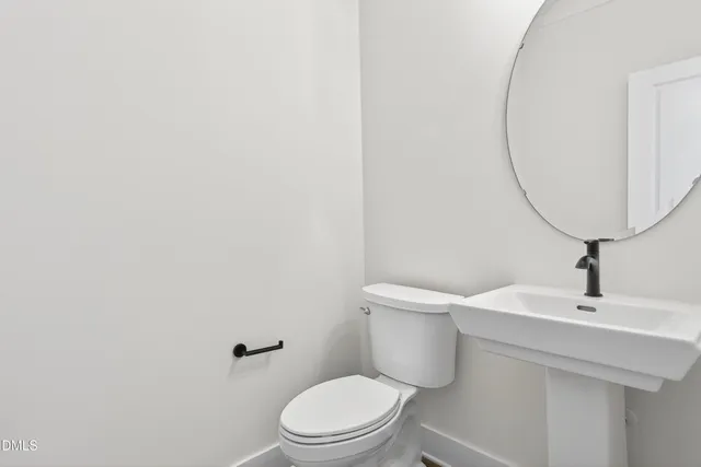 $925,000 | 209 West Maple Avenue, Holly Springs, NC 27540