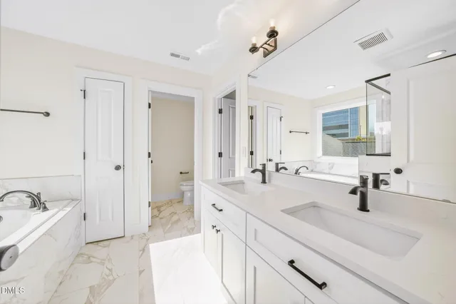 $925,000 | 209 West Maple Avenue, Holly Springs, NC 27540