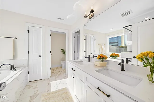 $925,000 | 209 West Maple Avenue, Holly Springs, NC 27540