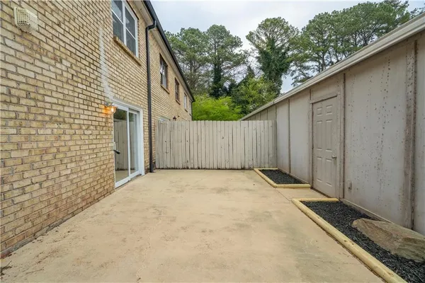 a view of a backyard of the house